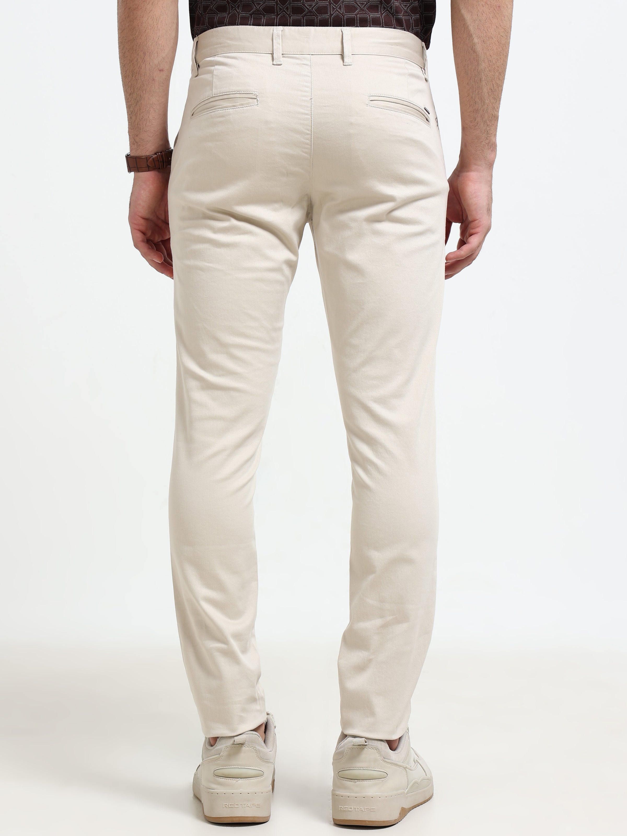 Men Cream Solid Satin With Lycra Ankle Fit Casual Trousers