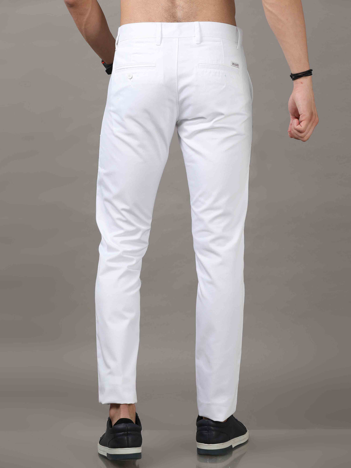 Shop Men's White Cotton Blend Narrow Fit Solid Causal Trouser Online.