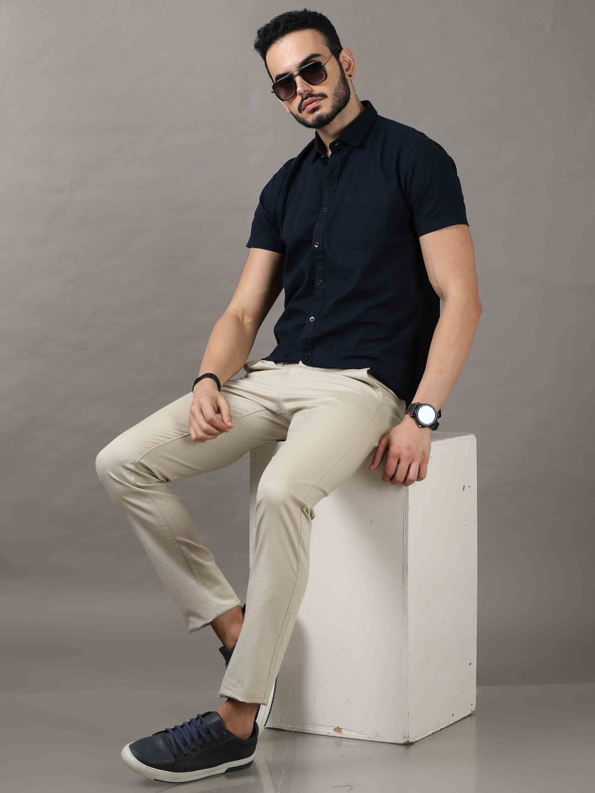 Shop Men's Cream Narrow Fit Cotton Solid Causal Trousers Online.