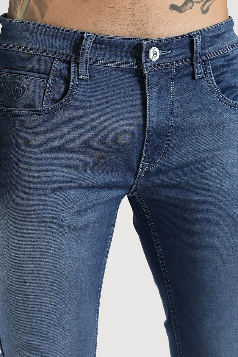 Men Blue Solid Ankle Fit Stretchable Denim Jeans