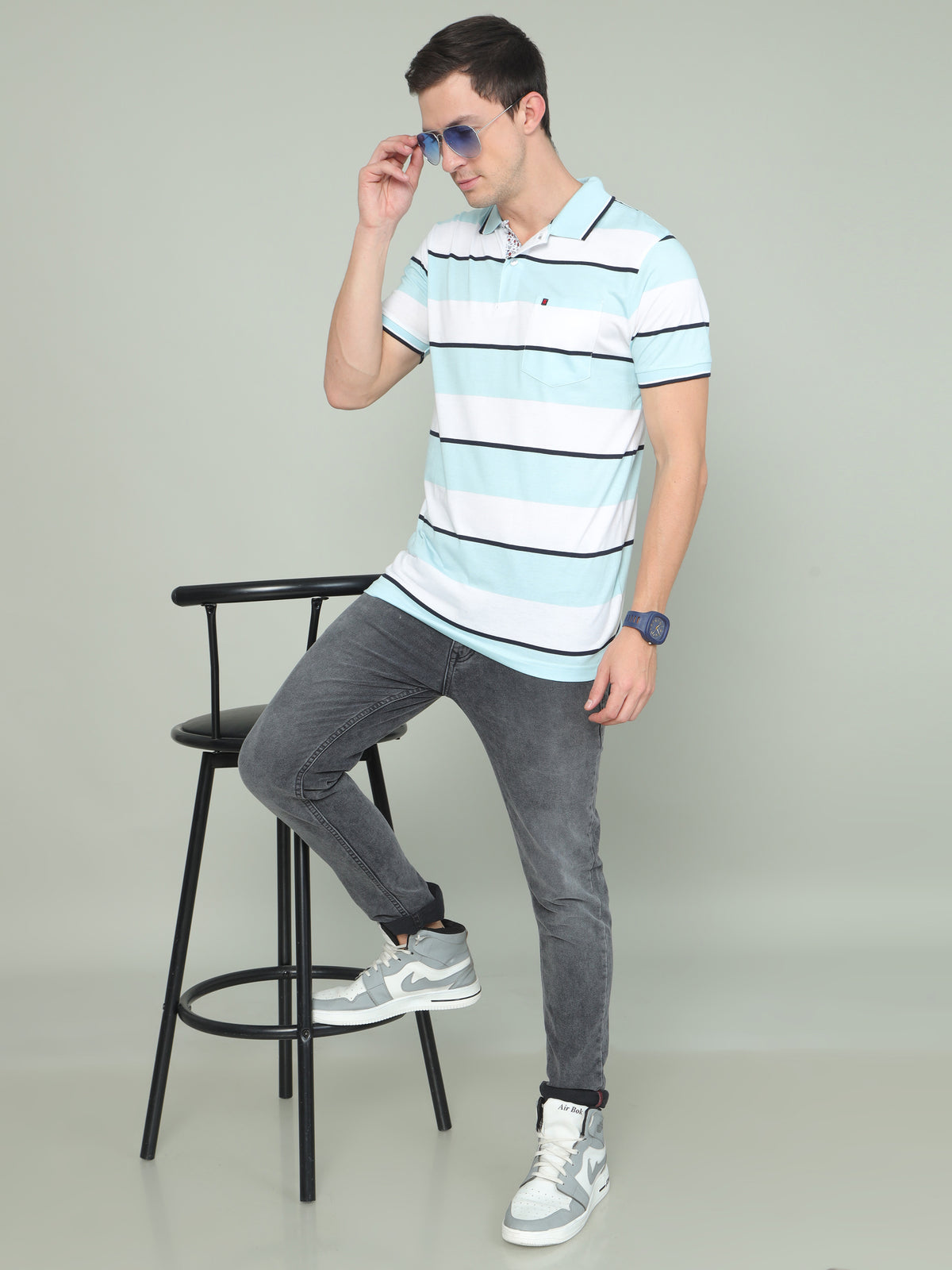 Shop Men's Sky Blue And White Regular Fit Stripe Half Sleeves Polo Neck T-Shirt Online.