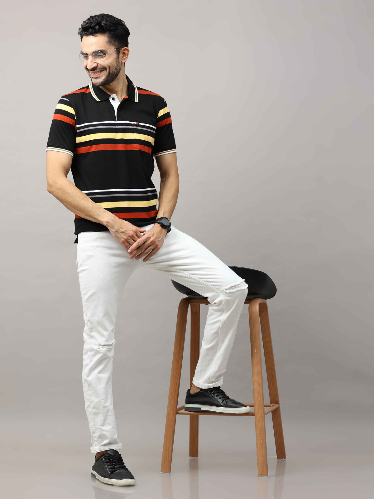 Shop Men's Black And Yellow Regular Fit Stripes Half Sleeves Polo T-Shirt Online.