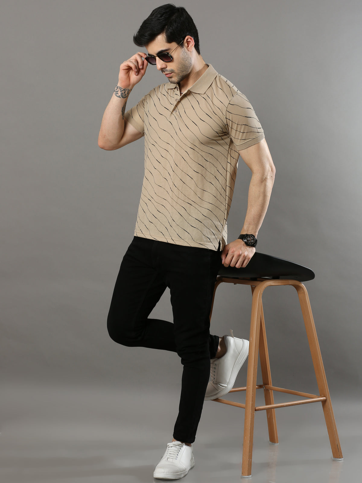 Shop Men's Beige Printed Regular Fit Polo Neck Half Sleeves T-Shirt Online.